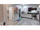 Modern kitchen with white cabinets and appliances at 117 N Sheffield Ave, Indianapolis, IN 46222