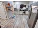Efficient kitchen featuring stainless steel appliances and vinyl flooring at 117 N Sheffield Ave, Indianapolis, IN 46222