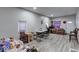 Open living room featuring hardwood floors at 117 N Sheffield Ave, Indianapolis, IN 46222