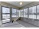 Cozy screened porch with brick walls and view of trees at 121 W Wind Chime Cir, Greenwood, IN 46143