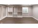 Basement area features built-in shelving, closet organizers and window for natural light at 1284 Jesse Ct, Greenwood, IN 46143