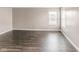 Bedroom featuring wood floors, neutral paint, and natural light at 1284 Jesse Ct, Greenwood, IN 46143