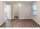 Bedroom featuring wood floors, natural light, and a closet at 1284 Jesse Ct, Greenwood, IN 46143