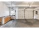 Attached garage with sink, cabinets and garage door opener at 1284 Jesse Ct, Greenwood, IN 46143