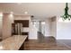 Modern kitchen featuring stainless steel appliances, granite countertops, and hardwood floors at 1284 Jesse Ct, Greenwood, IN 46143