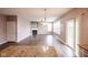 Inviting living room with a cozy fireplace and access to a patio area with a granite countertop at 1284 Jesse Ct, Greenwood, IN 46143