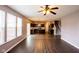Open-concept living area seamlessly connects to the kitchen, featuring modern flooring and ample natural light at 1284 Jesse Ct, Greenwood, IN 46143