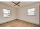 Bedroom with hardwood floors, ceiling fan, and window at 1425 Sabrina Cir, Plainfield, IN 46168