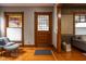 Inviting foyer with hardwood floors, decorative stained glass, and charming architectural details at 1468 Alabama St, Indianapolis, IN 46202