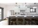 Bright kitchen features a large island, stainless steel appliances, and a subway tile backsplash at 1468 Alabama St, Indianapolis, IN 46202