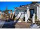 Front porch of white farmhouse, winter scene at 1602 S P St, Elwood, IN 46036