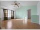 Bright living room with vaulted ceiling, hardwood floors, and neutral walls at 173 Davis Dr, Whiteland, IN 46184