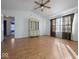 Spacious living room featuring hardwood floors and a vintage-style cabinet at 173 Davis Dr, Whiteland, IN 46184