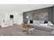 Bonus room with sectional sofa and a view of the home's upper floor at 19807 Patcham Rd, Westfield, IN 46074