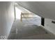 Large attic space with sloped ceilings and hardwood floors at 2035 Carrollton Ave, Indianapolis, IN 46202
