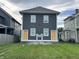 A home with an ample-sized lawn and fenced backyard, perfect for outdoor activities and relaxation at 2035 Carrollton Ave, Indianapolis, IN 46202