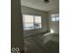 Spacious bedroom with hardwood floors and large windows at 2035 Carrollton Ave, Indianapolis, IN 46202