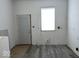 Renovated kitchen with new flooring and appliances at 2035 Carrollton Ave, Indianapolis, IN 46202