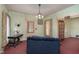 Spacious living room featuring a vintage sofa and decorative accents at 2088 E Eden Rd, Greenfield, IN 46140