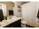 Clean bathroom with a toilet, shower, and modern vanity at 2394 Eagle Ave, Plainfield, IN 46168