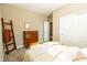Bedroom with a dresser, ladder, and queen bed at 2394 Eagle Ave, Plainfield, IN 46168