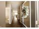 Bright and spacious entryway with hardwood floors and a view into the living area at 2394 Eagle Ave, Plainfield, IN 46168