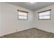 Simple bedroom with neutral walls and carpet at 2835 Walker Ave, Indianapolis, IN 46203