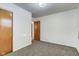 Clean bedroom with wood closet doors and carpet at 2835 Walker Ave, Indianapolis, IN 46203