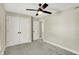 Bedroom with double door closet and ceiling fan at 3264 Orchard Ave, Indianapolis, IN 46218