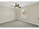 Spacious bedroom with ceiling fan and window at 3264 Orchard Ave, Indianapolis, IN 46218