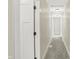 Bright hallway with neutral walls and carpeted floors at 3264 Orchard Ave, Indianapolis, IN 46218