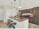 Modern kitchen with stainless steel appliances and granite countertops at 3264 Orchard Ave, Indianapolis, IN 46218