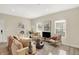 Bright living room featuring a comfortable couch and stylish decor at 3264 Orchard Ave, Indianapolis, IN 46218
