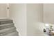 Gray carpeted staircase leading to the second floor at 3264 Orchard Ave, Indianapolis, IN 46218