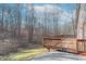 View of the wooded lot from the wooden deck attached to the home at 3510 E Copperstone Rd, Martinsville, IN 46151