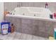 A full bath with a large jacuzzi tub and a tiled enclosure at 3510 E Copperstone Rd, Martinsville, IN 46151