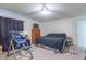Main bedroom with a ceiling fan, dresser, and closet at 3510 E Copperstone Rd, Martinsville, IN 46151