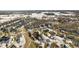 Aerial view of neighborhood showcasing homes in winter setting at 4289 S Carrie Dr, New Palestine, IN 46163