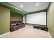 Finished basement home theater with projector and seating at 4348 Princeton Park Dr, Columbus, IN 47201