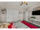Bright bedroom with built-in shelving and cozy bedding at 4543 W Meadows Ln, New Palestine, IN 46163