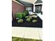Charming home featuring a beautifully landscaped front yard, complete with a cozy bench and well-manicured shrubbery at 4543 W Meadows Ln, New Palestine, IN 46163