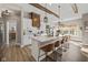 Modern kitchen with white cabinets, quartz countertops, and a large island at 4543 W Meadows Ln, New Palestine, IN 46163