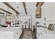 Spacious kitchen boasting white cabinets, quartz countertops, and stainless steel appliances at 4543 W Meadows Ln, New Palestine, IN 46163
