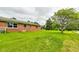 Brick house with a large green backyard at 4657 E 62Nd St, Indianapolis, IN 46220