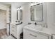 Double vanity bathroom with modern white cabinets at 4657 E 62Nd St, Indianapolis, IN 46220