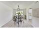 Dining room with a round table and modern chandelier at 4657 E 62Nd St, Indianapolis, IN 46220