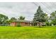 Brick ranch house with a large front yard at 4657 E 62Nd St, Indianapolis, IN 46220