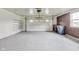 Attached garage with overhead storage and ample space at 4657 E 62Nd St, Indianapolis, IN 46220