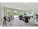 Bright living room with hardwood floors, sliding glass doors to patio, and comfortable seating at 4657 E 62Nd St, Indianapolis, IN 46220