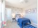 Firetruck-themed bedroom with a metal bed frame and playful decor at 4730 E Shadowbrook Dr, Camby, IN 46113